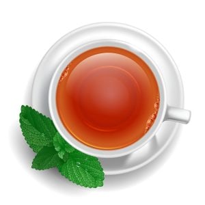 وکتور فنجان چای از بالا با برگ نعناع طراحی واقعی